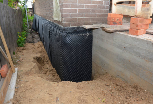 SJ Waterproofing Pros technician performing targeted Waterproofing assessment in Cleveland, NC